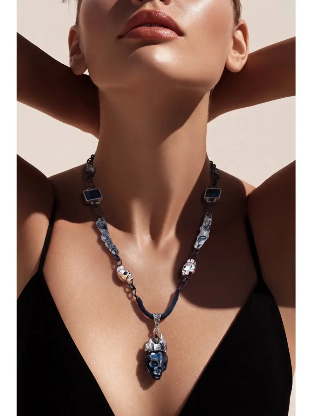 Gothic Elegance Aurora Crystal Skull Necklace | Black Onyx & Silver Metalwork